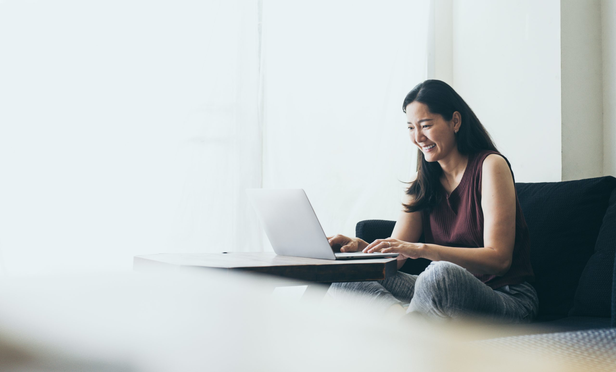 Woman using laptop.
